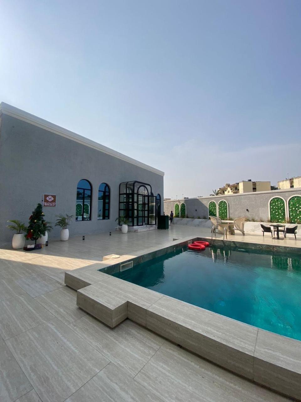 Sujimoto Residences Macdonald Lagos Bagian luar foto